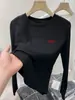Camiseta de manga larga de algodón puro para mujer, nuevo estilo otoño 2026, adecuada tanto para usar sola como debajo de otras prendas, top básico de canalé ajustado con cuello redondo