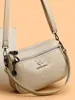 Bolso grande de mujer con relieve transfronterizo, nuevo modelo 2026 para madres de mediana edad, bolso para suegra, bolso de hombro y cruzado