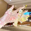 Llavero de botella flotante para taza de té de leche iceberg de cristal personalizado, un colgante de llavero de taza de té de leche personalizado, un pequeño regalo tanto para hombres como para mujeres