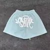 Marca de moda estilo americano SYNA WORLD Traje de manga corta estilo taladro High Street Hip Hop Ins Verano Pantalones cortos casuales para hombres y mujeres