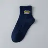 Calcetines con Letras Temporadas de Primavera y Verano Transpirables de Caña Media Deportivos Absorbentes de Sudor Resistentes al Desgaste Calcetines de Baloncesto para Hombres y Mujeres Combinan con Todo