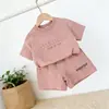 Nuevo Traje Deportivo Infantil de Moda Europeo y Americano con Letras para Niños y Niñas Camiseta de Manga Corta Pantalones Cortos Casuales para Bebé