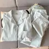 Pijama de forro polar estilo dulce con nudo de mariposa, nuevo conjunto de cárdigan de manga larga de moda otoño/invierno para mujer