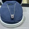 Aretes de oro de 18 quilates de Fred incrustados con diamantes con diseño de nudo doble y elegante collar con borla en forma de pera, un toque de lujo y moda