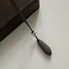 Collar con colgante ovalado de cordón de cuero minimalista estilo coreano, diseño de nicho de moda, cadena versátil para suéter para ir al trabajo