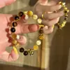 Pulseira Olho de Tigre do Deus da Fortuna Amarelo com Contas de Cristal Amarelo e Pingente Atrator de Riqueza Direto da Fábrica para Prosperidade e Riqueza