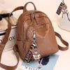 Mochila bolsa feminina mochila de couro pu bolsa feminina bolsa de mamãe feminina simples etiqueta fábrica uma geração de cabelo