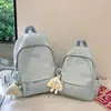 Novo modelo de mochila estudantil de grande capacidade, simples e versátil, mochila da moda para alunos do ensino fundamental, médio e médio