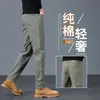 Pantalones casuales nuevos para hombre Otoño/Invierno 2026, algodón puro, cómodos, de alta gama, ligeros, versátiles, elegantes, de corte ajustado, de pierna recta para hombre
