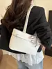 Bolsa de Axila Nicho Laço Doce Feminina 2025 Nova Moda Bolsa Tote Simples de Grande Capacidade Coreia do Sul