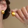Aretes de Oro Cepillado para Mujer 2025 Nuevo Estilo Caliente de Alta Gama Accesible Pendientes de Lujo Pendientes Redondos Elegantes para Rostro Pendientes