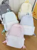 Mochila dulce con estampado estilo coreano para estudiantes de secundaria y preparatoria, con un diseño de ribete de encaje femenino, para uso transfronterizo.