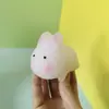 Nuevo cambio de luz conejo pellizco música descompresión conejo nuevo exótico lindo mascota conejo de jade conejo que cambia de color fábrica al por mayor