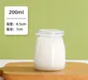 Garrafa de vidro transparente para iogurte e pudim 100ml atacado de fábrica forma de assar resistente a altas temperaturas garrafa de pudim logo imprimível