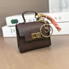 Mini cartera, charm de bolso de lujo, mini bolso de platino, llavero de coche lindo y creativo, bolsa para lápiz labial y audífonos