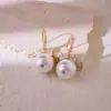 Pendientes de Gancho con Perla y Lazo de Circonita Estilo Francés Lujo Ligero Moda Exquisita Elegante Temperamento Accesorios de Oreja Versátiles de Gama Alta
