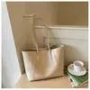 Bolso tote popular de gran capacidad transfronterizo para mujer, nuevo bolso casual simple para el hombro 2026, bolso de hombro versátil de moda para el trabajo