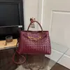 Bolso de mano horizontal tejido a mano transfronterizo para mujer, bolso cruzado versátil con diseño de lazo y hebilla de cuerda, bolso de hombro de gran capacidad