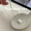 Design Minimalista Estilo Coreano Estilo Ins Joia de Prata Prata Pura S925 Colar Quadrado Liso com Laço Versátil para Mulheres com um Toque de Luxo