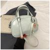 Primavera 2026 Nuevo Estilo Simple Nicho Moda de Gama Alta Versátil Celebridad de Internet Popular Venta Caliente Bolso Boston para Mujer de un Solo Hombro y Cruzado