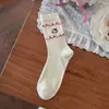 Calcetines de media pantorrilla para mujer de primavera y verano, calcetines lindos de dibujos animados del gato KT apilados, calcetines largos bordados, calcetines de algodón puro huecos transpirables