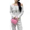 Camiseta de manga larga off-shoulder para mujer, nuevo estilo otoño 2026, sexy off-shoulder, holgada, estilo puro deseo, top asimétrico de hombro para estudiantes para mujer