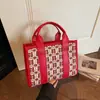 Bolsa tote feminina vermelha estilo coreano 2026 novo modelo bolsa de noiva bolsa para damas de honra bolsa de trabalho