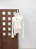 Viento mínimo ro otoño/invierno 2024 sentido de leche fu * serie nueva de la familia du suéter con solapa irregular cremallera abrigo corto pantalones