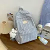 Estilo Nuevo Mochila de Cuadros para Estudiantes Estilo Commuter para la Universidad Gran Capacidad Ligera Versátil para Mujeres 2026