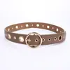 Cinturón versátil nuevo con ojales metálicos para mujer, cinturón de cuero perforado, moda estilo punk coreano, cinturón decorativo hueco