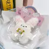 Pequeños regalos de fiesta empaquetados individualmente, lindos colgantes de peluche, muñecos de dibujos animados, muñecos para lanzar en bodas, recuerdos de fiesta y decoraciones colgantes