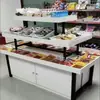 Expositor, estante para exhibición de cosméticos, vitrina central, vitrina para joyería, estante de supermercado de tres niveles, estante de exhibición promocional