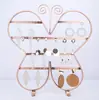 Nuevo y lindo expositor de pendientes de mariposa al por mayor moda exquisitos pendientes estante para joyas estante de joyas de hierro