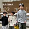 Nuevos estilos de otoño e invierno: camisetas interiores de cuello alto para niños, camisetas para niños, capas base versátiles y elegantes de manga larga para niños mayores