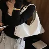 Bolso tote texturizado transfronterizo 2026 nuevo bolso de mano de verano bolso de hombro de moda con tachuelas bolso de axila de gran capacidad para mujer