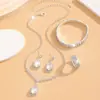 Conjunto de Collar, Pendientes y Pulsera Europeos y Americanos Transfronterizos de Moda con Gota de Agua y Pedrería Cadena de Garra de Diamante Completo Popular Conjunto de Temperamento de Gama Alta