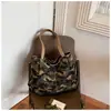 Bolsa tote de lona camuflada vintage feminina com design estiloso, grande capacidade, adequada para o dia a dia, comércio exterior transfronteiriço