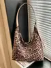 Bolsa de ombro para mamãe e bebê de grande capacidade para exportação, nova moda outono/inverno 2026 estampa de leopardo bolsa de trabalho, bolsa transversal retrô versátil