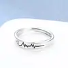 Anillo de pareja un par de anillo para hombre y mujer con electrocardiograma incrustado de diamantes simple coreano boca viva estudiante Fábrica venta al por mayor regalo