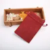 9x 12 cm en stock bolsa de lino imitación suministro de fábrica caja de joyería cordón de lino logotipo personalizado protección ambiental