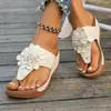 Sandalias de Exterior de Cuña Abiertas Transfronterizas 2026 Verano Nuevo Talla Grande con Estampado de Flores Negras