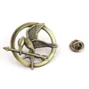 Insignia metálica de la película europea y americana Los Juegos del Hambre Mockingjay pájaro burlón broche