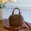 Bolsa de Mão Feminina com Design de Nicho Estilo Coreano 2026 Nova Bolsa de Mão Quadrada Pequena Vintage Bolsa Transversal Versátil de Alta Qualidade