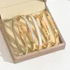 Nuevo brazalete de acero inoxidable 2026, un artículo popular y elegante para ventas transfronterizas en Europa y EE. UU., con un diseño delicado y lujoso con piedras de circonita cúbica microincrustadas, un brazalete de alta gama para mujer