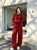 Conjunto deportivo casual de moda para otoño para mujer, con una sudadera juvenil y elegante de media cremallera y pantalones de pierna ancha