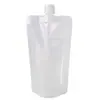 En stock bolsa auto-soportante transparente para líquidos con boquilla de succión bolsa para cerveza diámetro grande a prueba de fugas bolsa desechable para leche de soya bolsa para medicina tradicional china