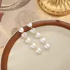 Pendientes Largos de Temperamento Coreano con Aguja de Plata s925 Pendientes de Perla de Amor para Rostro Piel Delgada Pendientes Estilo Hepburn de Celebridad Clip para Oreja