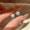 Pendientes Flor de Iris Asimétricos Dorados 2026 Nuevo Estilo Exquisitos Lujo Ligero Elegantes Diseño de Nicho Pendientes Joyería Personalización