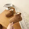 Botas de nieve para niños 2026 invierno nuevo zapatos para niños niñas preescolar zapatos de algodón más terciopelo más gruesos botines para niños simples antideslizantes