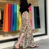 Saia Longa de Cintura Alta com Fenda Linha A Estampada de Leopardo Moda Tendência Verão 2026 para Mulheres Ligeiramente Acima do Peso Emagrecedora